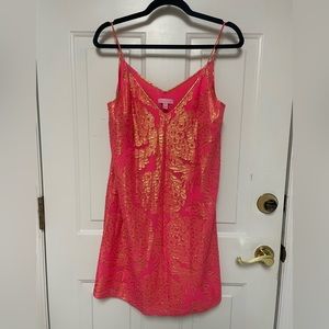 Lilly Pulitzer gold and coral cocktail dress.